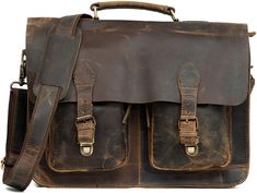 an old brown leather bag with two compartments and straps on the front, sitting upright