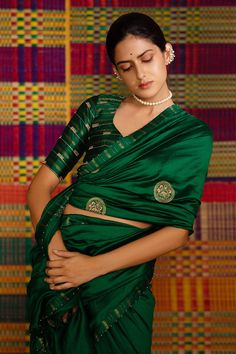 Emerald green haritah embroidered saree with mandala motifs. Comes with blouse.
Component: 2
Pattern: Embroidery
Type Of Work: Mandala
Sleeve Type: Half
Fabric: Maheshwari Silk
Color: Emerald Green
Other Details: 
Zari embroidery
Tassel detailing
Occasion: Wedding - Aza Fashions Bollywood Style Green Pre-draped Saree With Motifs, Embroidered Pista Green Pre-draped Saree For Navratri, Green Resham Embroidery Pre-draped Saree For Puja, Green Pre-draped Saree With Resham Embroidery For Puja, Pista Green Embroidered Blouse With Traditional Drape, Green Cutdana Embroidered Fabric For Designer Wear, Traditional Drape Green Blouse For Eid, Green Traditional Style Blouse For Eid, Green Traditional Drape Blouse For Eid