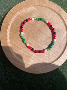 A super cute fun summer bracelet! 🍉✨ Watermelon Seed Bead Bracelet, Casual Everyday Friendship Bracelets With Spacer Beads, Colorful Handmade Casual Jewelry, Casual Colorful Handmade Jewelry, Fun Beaded Heishi Beads Bracelets, Vacation Beaded Bracelets With Spacer Beads, Green Friendship Bracelets With Colorful Beads For Vacation, Casual Colorful Bracelets With Spacer Beads, Green Beaded Friendship Bracelet For Vacation