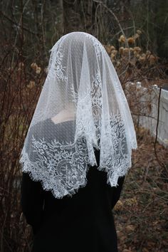 This is SOFT! In lovely soft, white floral lace, this small, rectangular chapel veil is soft and lightweight. A sewn in clip holds it in place. It comes with our free veil storage bag! Please convo us with any questions or special requests! Blessings! Our veils are custom made for you! Please see the Shipping & Returns section for our current processing times. Prefer a sewn-in clip? See listing details to see if one is included with your veil. If not, you may request one -if desired- in a no Lace Veil With Lace Trim For Ceremonies, Lace Ceremony Veil With Lace Trim, Ceremony Lace Veil With Lace Trim, Ceremony Veil With Lace Trim, Church Lace Veil With Lace Work, White Fitted Lace Veil, White Lace Trim Veil For Ceremony, Lace Wedding Veil With Lace Trim, White Delicate Lace Veil For Ceremony