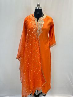 Orange Zari Embroidered Kurta with Trousers & Dupatta For Indian Party Wear Pakistani Salwar Kameez / Indian Wedding Dress / Plus Size Cotton Dress Traditional Indian Wear / Salwar Kameez Dupatta / Kurti Palazzo Set The set contains: 1 Straight Kurta 1 Palazzo  1 Dupatta Kurta: The orange embroidered Kurta has a round neck design. The Kurta measures till calf length and has straight hemline. Sleeve length :  3/4 Sleeves Palazzo :  Orange trousers has elasticated waistband and slip on closure . Dupatta: Dupatta comes with embroidered pattern as well. Material : Kurta :  Silk Blend Palazzo : Silk Blend Dupatta : Net Fabric Care : Hand wash Please see the size information below to choose a perfect size for yourself:  (size in inches)  XS : BUST 34 | WAIST 30 | HIPS 38 S : BUST 36 | WAIST 32 | Long Semi-stitched Embroidered Salwar Kameez, Long Embroidered Salwar Kameez For Diwali, Fitted Anarkali With Embroidered Border, Diwali Embroidered Long Salwar Kameez, Long Sleeve Sharara With Embroidered Border For Festivals, Fitted Sharara With Embroidered Border For Eid, Embroidered Long Churidar For Festive Season, Festival Long Sleeve Sharara With Embroidered Border, Summer Semi-stitched Embroidered Dresses