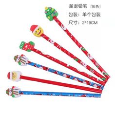 six christmas themed toothbrushes are lined up