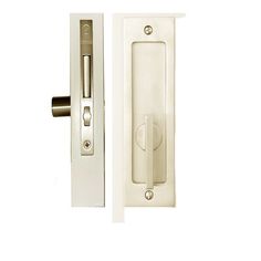 an open door with a white handle and knob