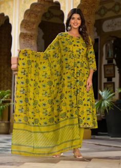 Grab this beautiful 3-piece set. The set comes with anarkali style block print & embroidered kurta has round neck, 3/4th sleeves & calf length teamed with printed trouser pants and a chanderi cotton dupatta to match. Color - Green Kurta Fabric-Viscose Pant Fabric-Viscose Dupatta Fabric- Chanderi Cotton Neck-Round Neck Sleeves-3/4th Sleeves Work - Block Print & Embroidery Detailing Washing Instructions-Dry Clean Model Height - 5.5 wearing size small. DISCLAIMER - The color of the product may be differ due to screen settings of device. A misprint here and a colour drop slip there is the beauty of printing which is not treated as a defect. Festive Kurta With Printed Motifs And 3/4 Sleeves, Festive Kurta With 3/4 Sleeves And Printed Motifs, Festive 3/4 Sleeve Kurta With Printed Motifs, Anarkali Sets With Printed Motifs In Yellow, Semi-stitched Block Print Long Sleeve Sets, Festive Cambric Block Print Sets, Festive Cambric Sets With Block Print, Block Print Cambric Straight Kurta Set, Designer Wear Block Print Sets For Eid