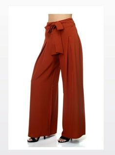 New Haute Monde Pleated Front Tie Palazzo Pants- Brick- Size Small - Womens. Condition is New with tags. Shipped with USPS First Class. **All measurements were taken laying flat on the floor** Measurements: 43 in. Front lenght. 32 in. Inseam. 14 1/2 in. High waist width. 13 in. from high waist to crotch. The fabric on these pants is high quality. They are flowy and lightweight. These pants are great for a party. The belt is not removable. It is a self tie belt. 🌟AVAILABLE IN SIZES MEDIUM AND LA Versatile High Waist Belted Bottoms, Versatile Belted Trousers, High Waist Belted Versatile Pants, Versatile High Waist Belted Pants, Fall Trousers With Tie Waist, Fall Tie Waist Wide-leg Pants, Fall Wide-leg Pants With Tie Waist, Trendy Tie Waist Pants For Fall, Stretch High Waist Bottoms With Tie Waist