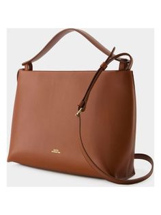 Meet the Ashley Crossbody - the perfect accessory for both your casual and dressy outfits. This versatile bag is the ideal blend of fashion and function, keeping your essentials organized and easily accessible on the go. Dimensions: Width: 27.5cm, Height: 20.5cm, Depth: 9.5cm Brown Satchel With Round Handle For On-the-go, Chic Brown Bag With Round Handle, Rectangular Hobo Bag For Work With Top Handle, Rectangular Hobo Bag With Top Carry Handle For Work, Brown Bag With Removable Pouch And Round Handle, Brown Bucket Bag With Detachable Handle For Work, Workwear Hobo Shoulder Bag With Top Carry Handle, Hobo Shoulder Bag With Top Carry Handle For Work, Brown Bag With Top Carry And Round Handle