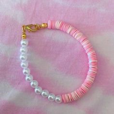 A beautiful pink , pearl bracelet! Handmade Pink Pearl Bracelet, Elegant Pink Beaded Bracelets For Beach, Pink Beaded Round Pearl Bracelet, Adjustable Pink Pearl Chain Jewelry, Trendy Pink Pearl Chain Jewelry, Pink Pearl Chain Jewelry With Round Beads, Handmade Pearl Bangle Bracelets, Pink Pearl Bracelet Gift, Adjustable Pink Pearl Bangle