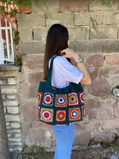 In stock! Granny square crochet dark green ground patchwork afghan bag is the perfect accessory for all your summer and winter outfits. Vibrant cotton colors are used in the crochet bag. It does not take up space in your closet, it is stylish and flashy. Bag Size Width 44 cm / 17.3 inch Height 33 cm / 12.9 inch Strap length 55 cm / 21.6 inch Lined, Pockets and Snaps washing information It can be washed in the hand wash program at 36F / 30C. You can lay it on a flat surface and dry it. Wish you h Green Patchwork Shoulder Bag For Travel, Green Patchwork Tote Shoulder Bag, Green Patchwork Shoulder Bag For Everyday, Green Patchwork Shoulder Bag For Daily Use, Everyday Green Patchwork Shoulder Bag, Everyday Green Patchwork Bags, Green Patchwork Bags For Daily Use, Handmade Green Rectangular Bag, Green Rectangular Shoulder Bag With Patchwork