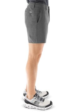 With the look of flat-front chinos and the performance features of swimwear, these hybrid shorts easily take you from the beach to the bar and beyond. The quick-drying technical fabric is made with recycled fibers, plenty of stretch and a hint of cotton for softness. 6" inseam; 10 1/2" front rise Zip fly with button closure Front slant pockets; back-zip welt and welt pockets Moisture-wicking fabric engineered for dryness and comfort Four-way-stretch fabric 75% recycled polyester, 17% cotton, 8% Cotton Golf Bottoms With Built-in Shorts, Cotton Bottoms With Built-in Shorts For Golf, Golf Bottoms With Built-in Shorts In Cotton, Stretch Golf Bottoms Short Length, Sporty Fitted Cotton Swim Trunks, Summer Golf Bottoms In Short Style, Summer Golf Bottoms Short, Casual Fitted Golf Shorts, Functional Golf Bottoms With Built-in Shorts