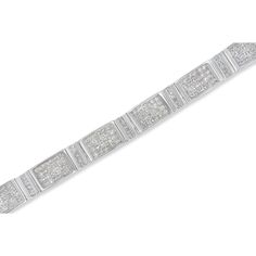 A must have for any serious jewelry collection, this stunning 14K white gold tennis bracelet boasts an impressive 7.0 carat total weight of diamonds with a whopping 308 individual stones. The bracelet features alternating vertical and horizontal rectangular links. The horizontal links feature grids of invisible set princess cut diamonds, while the vertical links feature single rows of channel set princess cut diamonds. Each diamond studded link is connected by hinges. Elegant and timeless, this