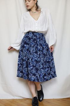 Feminine vintage pleated skirt with a floral print.  The material is soft and it beautifully moves with every single step. The waistband does not stretch.  It has an A-line silhouette and a pleated front. Additionally, pockets are placed on both sides.  Perfect for feminine or boho outfits. The person in the photos is 161 cm / 5' 3" tall. Material: 100% Viscose Vintage condition: Perfect 10/10 Size: size 38 marked on the tag, but real measurements are closer to XXS Waist: 64 cm / 25,2 inch (wais Flowy Long Floral Print Pleated Skirt, Vintage Flowy Skirt Bottoms For Daywear, Vintage Flowy Skirt For Daywear, Vintage Pleated Lined Skirt For Spring, Spring Vintage Flared Pleated Skirt, Spring Vintage Pleated Skirt, Vintage Pleated Skirt For Spring, Vintage Spring Pleated Midi Skirt, Vintage Spring Midi Pleated Skirt