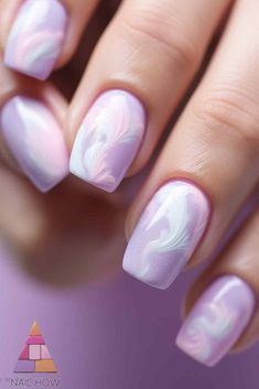 Lavender watercolor marble nail art - soft lilac and white swirls create a dreamy, cloudy design perfect for pink summer nails. Visit nailhow.com for more pink summer nail ideas. Lilac Swirl Nails, Pink Summer Nail Ideas, Lilac Marble Nails, Lilac And White Marble Nails, Marble Purple Nails, Pastel Purple Marble Nails, Marbled Purple Nails, Cloudy Design