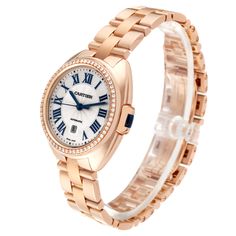 Cartier Cle Rose Gold Diamond Automatic Ladies Watch WJCL0003 Box Papers. Automatic self-winding movement. Round 18K rose gold  case 31 mm in diameter. Flush-mounted crown set with the blue sapphire cabochon. 18K rose gold original Cartier factory diamond bezel. Scratch resistant sapphire crystal. Flinque dial with a sunray guilloche pattern center and roman numerals. Blue sword shape hands. Minute markers around an inner ring. Date window at 6 o'clock. 18k rose gold bracelet with double deploya Timeless Rose Gold Watch Accessories For Anniversary, Rose Gold Watches With Round Dial For Wedding, Classic Rose Gold Watches For Weddings, Classic Rose Gold Round Jewelry And Watches, Classic Round Rose Gold Jewelry And Watches, Formal Rose Gold Jewelry And Watches With Metal Dial, Formal Round Rose Gold Jewelry And Watches, Formal Rose Gold Round Jewelry And Watches, Anniversary Rose Gold Diamond Watch