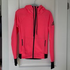 Nwot Adidas Track Hoodie Jacket Xs. Gorgeous Bright Coral Pink Color With Black Adidas Logo And Trim And Zipper. Jacket Features Thumb Holes. Functional Long Sleeve Track Jacket For Winter, Functional Long Sleeve Winter Track Jacket, Winter Long Sleeve Functional Track Jacket, Fitted Hooded Sportswear Outerwear, Adidas Sports Hoodie For Fall, Adidas Sports Sweatshirt With Double-lined Hood, Adidas Sweatshirt With Double-lined Hood For Sports, Hooded Fleece Jacket For Spring Streetwear, Athleisure Hooded Fleece Jacket For Winter