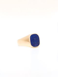 Harkening back to antique rings found at swap meets and on your grandpa's hand, our signature signet style is designed to be well worn. Made with either sterling silver, 14k or 18k gold, the ring will only get better with age. Lapis Lazuli has been prized since antiquity for its intense color. During the Middle Ages and Renaissance it was ground down and made into ultramarine, the finest and most expensive of all blue pigments. Lapis Lazuli is often flecked with pyrite, combining the blue of the Lapis Lazuli Mens Ring, Untreated Heirloom 14k Gold Jewelry, Formal Gemstone Signet Ring Open Design, Formal Gemstone Open Signet Ring, Formal Open Signet Ring With Gemstone, Antique 14k Gold Rare Signet Ring, Classic Gold Signet Ring With Gemstone, Formal Sterling Silver Yellow Gold Signet Ring, 14k Gold Open Signet Ring With Gemstone