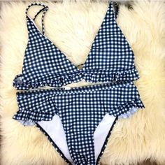 Gingham Blue And White Ruffle Bikini Size M Blue And White 82% Polyester 18% Spandex Triangle Bikini Top Padding Included Adjustable Straps Full Coverage Bikini Bottoms Side Ruffles Top And Bottom Included New Without Tags New To Poshmark? Use Code Reclaimed7287 When You Sign Up For $10 Off! Gingham Triangle Top Swimwear For Pool, Plaid Swimwear For Summer Pool Time, Summer Gingham Swimwear For Pool, Gingham Triangle Top Swimwear For Beach Season, Poolside Gingham Triangle Top Swimwear, Plaid Triangle Top Swimwear For Summer, Fitted Gingham Swimwear For Poolside, Fitted Plaid Triangle Top Swimwear, Fitted Gingham Summer Swimwear