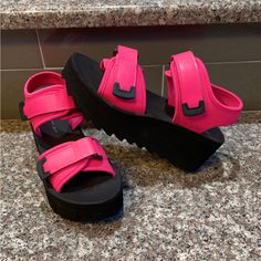 Brand New, Never Worn!! Velcro Straps Foam Platform 1.5” At The Toe 2.5” Heel Hot Pink & Black Size 7 Rare & Very Hard To Find!!! #Barbiecore Smoke Free Reach Out For More Details Trendy Pink Ankle Strap Sandals, Pink Casual Sandals With Open Heel, Casual Pink Sandals With Open Heel, Casual Pink High Heel Sandals, Trendy Pink Synthetic Sandals, Casual Pink Open Heel Sandals, Pink Wedge Sandals With Ankle Strap And Buckle Closure, Pink Ankle Strap Wedge Sandals With Buckle Closure, Pink Open Toe Synthetic Wedge Sandals