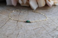 This little bracelet made with high quality materials makes a great gift. Customise it by choosing the gemstone  and chain of your choice. D E T A I L S  *It features top quality gemstone rondelles. They are very nicely cut for maximum sparkle. *Choose between a 14k gold filled/rose gold filled or sterling silver chain. *Gold filled is a wonderful alternative to solid gold and unlike gold plating does not rub off. *It closes with a hallmarked spring clasp measuring 6mm. *Bracelet comes care instructions and a matching crystal information card and is ready for gifting. S I Z I N G * H E L P Choose the length from the drop down menu. Use the length guide as a reference. If unsure choose the extender option which will allow room for adjustment. For example if you choose the 6.5 inch option yo Dainty Tiny May Birthstone Jewelry, Dainty Green Jewelry For Everyday, Green Dainty Jewelry For Everyday, Dainty Green Everyday Jewelry, Dainty Faceted Jewelry For May Birthstone, Dainty Faceted May Birthstone Jewelry, Dainty May Birthstone Bracelets For Anniversary, Everyday Emerald Birthstone Jewelry, Dainty Emerald Birthstone Jewelry