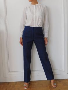 "80s French winter military pants in navy blue. Sturdy, well cut and chic.  Perfect Unisex tailored pants Material: Wool blend Estimated size: XS - S Measurements: waist: 68cm/ 26\"8 Hip: 84cm/33\"1 Length at the side seam: 103cm / 40\"1 Please note that most of our vintage items are not new and may have minor flaws due to pre-loved wear We are advocates of buying used and hope you can appreciate this garment and its character. items are pre-handwashed/de-pilled/mended if needed and any major fl Vintage Cargo Trousers For Fall, High Waist Blue Cargo Pants For Work, Classic Navy High-waisted Pants, Classic High-waisted Cargo Pants, Vintage Cargo Pants For Fall Workwear, Retro Straight Work Pants, Navy Wide Leg Pants With Belt Loops, Navy Straight Work Pants, Vintage Workwear Pants For Fall