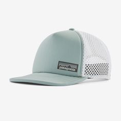 the patagonia trucker hat in light blue and white is shown from the front