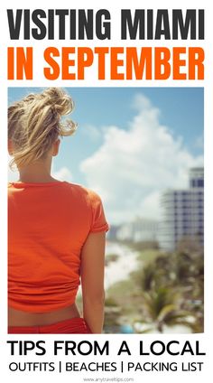 a woman in an orange top is looking out over the ocean with her back to the camera