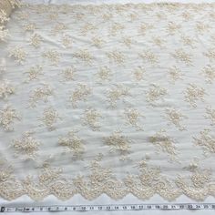 Introducing a truly unique, high-end collection of exquisite Beaded & Corded bridal lace fabric, embroidered on 100% Polyester net mesh. A perfect option for wedding dresses, evening gowns, quinceanera dresses, and dance costumes, this fabric comes in 5 colors and is approximately 54" wide. Boasting a gorgeous corded or beaded couture lace with exquisite pearl and sequin detailing, this fabric is sure to leave a lasting impression. The perfect decorative and elegant corded or beaded special occa Beaded Couture, Quinceanera Crown, Corded Lace Fabric, For Wedding Dresses, Beaded Lace Fabric, Bridal Lace Fabric, Beautiful Wedding Gowns, Embroidered Lace Fabric, Bridal Fabric