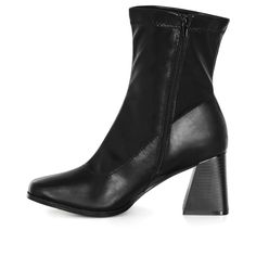 Embrace modern style with the Robbie Ankle Boots, featuring a trendy square toe and chic ankle boot length. Crafted from faux-leather, these boots not only look good but also contribute to cruelty-free fashion. The block heel adds an element of sophistication, making them the perfect choice for a fashion-forward look. Bold and fiercely fashionable, no one does plus size fashion like City Chic. Loved around the globe for its diverse range of fashion-forward styles for any occasion. From show-stop Trendy Ankle Heeled Boots For Work, Trendy Mid-calf High Ankle Boots For Work, Trendy High Ankle Heeled Boots For Work, Black Modern Mid-calf Boots With Square Toe, Trendy Ankle-high Heeled Boots For Work, Trendy Black Mid-calf Boots With Square Toe, Trendy Medium Width Boots For Office, Trendy High Ankle Heeled Boots For Office, Trendy Mid-calf Boots For Workwear Medium Width