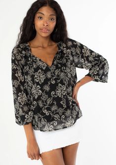 Floral print Chiffon Relaxed fit Sheer voluminous long raglan sleeves Elastic wrist cuffs Split v-neckline with tassel neckties Sheer Lining included Flowy bohemian top Bohemian V-neck Peasant Top With Floral Print, Elegant V-neck Peasant Top For Fall, Spring V-neck Peasant Top With Blouson Sleeves, Flowy V-neck Blouse With Floral Print, Casual Floral Print Peasant Top With Lantern Sleeves, Casual Peasant Top With Floral Print And Lantern Sleeves, Casual Billowy Blouse With Floral Print, Flowy Peasant Top With Lantern Sleeves, Flowy Chiffon Blouse With Floral Print