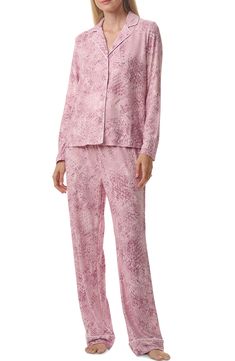 An allover print adds colorful fun to this set of pajamas that includes a long-sleeve button-front top and elastic-waist pants. Includes top and bottoms Top has front-button closure and long sleeves Bottoms have elastic waist 95% polyester, 5% elastane Machine wash, tumble dry Imported Casual Long Sleeve Patterned Sleepwear, Patterned Printed Long Sleeve Sleepwear, Pink Sleepwear With Button Closure For Loungewear, Long Sleeve Loungewear Sets With Button Closure, Spring Pink Sleepwear With Button Closure, Pink Button Closure Sleepwear For Spring, Pink Sleepwear With Button Closure For Spring, Spring Button-up Sleepwear For Pajama Party, Relaxed Fit Sleepwear With Button Closure For Pajama Party