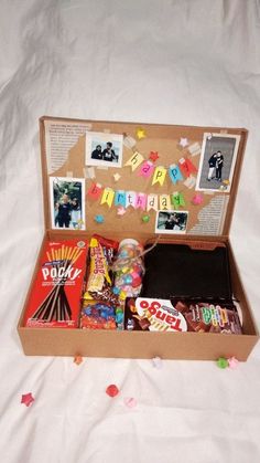 an open suitcase filled with candy and candies