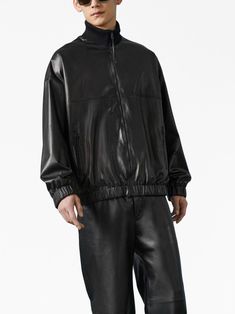 leather bomber jacket from Gucci featuring black, lambskin, embossed logo to the rear, ribbed band collar, front zip fastening, long sleeves, two side zip-fastening pockets, elasticated cuffs and elasticated hem. This item is in size 48 and the color is Gucci Long Sleeve Track Jacket For Winter, Gucci Long Sleeve Track Jacket For Fall, Gucci Casual Track Jacket For Winter, Gucci Casual Winter Track Jacket, Casual Gucci Winter Track Jacket, Casual Long Sleeve Gucci Track Jacket, Gucci Black Outerwear For Streetwear, Gucci Winter Outerwear With Ribbed Cuffs, Gucci Fall Streetwear Outerwear