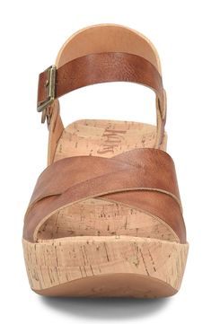 A cushioned footbed and adjustable slingback strap bring customized comfort to a sandal lifted by a cork-wrapped platform and wedge heel. 2 3/4" heel; 1" platform Synthetic upper/textile lining/rubber sole Imported Comfortable Wedges Sandals, Most Comfortable Sandals, Comfortable Wedges, Wedges Sandals, Straw Bags, Flip Flop Slippers, Clutch Pouch, Designer Crossbody Bags, Sweaters And Leggings