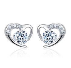 You will feel like you are wearing expensive diamond earrings when you put these elegant studs on! Made with 925 Sterling silver and white gold with clear cubic zirconia that sparkles like a diamond in the light These silver earrings are exquisite, but are also sturdy and built for longevity. Perfect for every occasion Sterling Silver Heart Earrings, Silver Heart Earrings, Purple Diamond, Heart Shaped Earrings, Heart Studs, Paros, Heart Earrings Studs, Diamond Fashion, Girls Earrings