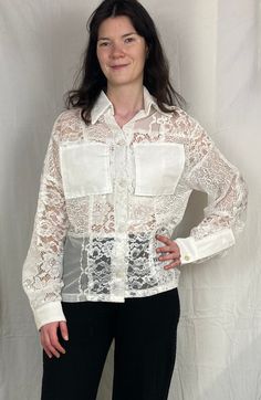 A white blouse with a difference. The lace fabrics are so beautiful and the patchwork makes this piece a unique one of a kind. Wear to the office or as a casual piece with jeans. I upcycled and handmade this Darcy blouse from vintage lace tablecloth offcuts. - Classic cuffs, collar and button down shirt design - One of a kind patchworked fabric - Lace fabrics - Pockets Best fit is up to size 14 for slightly oversized. Bust - 102cm Waist - 102cm Hips - 102cm With Scrapping 'Ell, you can always gu Casual Lace Blouse With Lace Patchwork, Lace Patchwork Tops, Summer Lace Patchwork Tops, Summer Lace Top With Patchwork, Casual Lace Blouse With Lace Work, Elegant White Patchwork Blouse, Elegant White Blouse With Patchwork, Elegant White Patchwork Top, Elegant White Tops With Patchwork