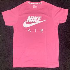 Brand New Without Tags. Never Worn Or Tried On. Great Work-Out Tee Or Just A Casual Tee. Pink In Color. Tagless. Authentic Nike Apparel Trendy Pink Workout T-shirt, Sporty Pink T-shirt With Logo Print, Nike Summer Workout T-shirt, Nike T-shirt With Text Print For Sports, Nike T-shirt With Text Print And Crew Neck, Sportswear Cotton Tops With Letter Print, Nike Casual Workout T-shirt, Pink Sportswear T-shirt For Workout, Trendy Moisture-wicking Crew Neck Top