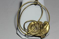 "Vintage Brutalist Brass Bronze Organic Studio Artisan Necklace. * HALLMARKS Unsigned * MEASUREMENTS Chain 36\" long. Pendant 3\" x 3 3/8\". * WEIGHT 66.4 Grams * MATERIALS Brass Large 1960s 70s studio handcrafted Brutalist necklace. I wasn't able to find any markings. Necklace is in very good condition with nice patina on brass. Necklace will arrive gift boxed. Thank you for stopping by!!" Handmade Brass Modernist Jewelry, Handmade Modernist Brass Jewelry, Modernist Gold Brass Jewelry, Gold Brass Modernist Jewelry, Collectible Gold-tone Brass Jewelry, Vintage Hand Forged Brass Jewelry, Vintage Hand Forged Gold Necklace, Vintage Gold Hand Forged Necklaces, Vintage Gold Hand Forged Necklace