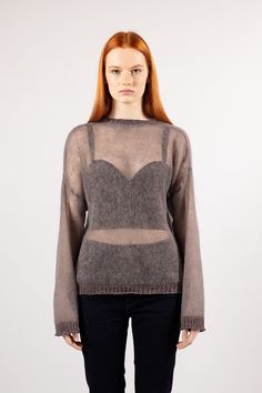 Lightweight and sheer, yet warm and soft mohair sweater LUNA. It is perfect for day-to-night wear all year round. The shiny details add a touch of sophistication and can be worn to a more formal evening event as well. It will become a favorite in your wardrobe due to its comfortable and relaxed cut. Material: 70% mohair, 30% polyamide. Size: XS to XXL. Available colors: brown, white, black. Length: 58-63cm. Our model Diana is 1,73cm and is wearing size S. Features: - sheer structure - straight c Sheer Long Sleeve Sweater For Fall, Fall Mohair Crew Neck Top, Fitted Mohair Sweater For Layering, Fine Knit Mohair Tops For Fall, Winter Fine Knit Mohair Tops, Pull Marron, Haut Transparent, Mohair Sweater Knit, Horse Sweater