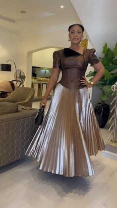 Introducing our stunning 2-piece outfit set, designed for the modern woman who values both elegance and versatility.  This ensemble features a statement metallic pleated skirt and a structured, textured blouse with unique sleeve details.  Whether you're attending a sophisticated evening event or making a bold statement at a daytime function, this set has you covered. ✨️PRODUCT HIGHLIGHTS✨️ - 2-PIECE SET: Available as a full outfit or can be purchased as separates--choose the blouse, skirt, or th Glamorous Fitted Dress With Full Skirt, Chic Two-piece Wedding Dress, Elegant Two-piece Wedding Set, Chic Two-piece Dress For Wedding, Two-piece Short Sleeve Party Dress, Elegant Two-piece Dresses For Wedding, Fitted Two-piece Dress For Cocktail, Elegant Two-piece Wedding Dresses, Elegant Two-piece Evening Dress