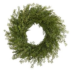 a green wreath with leaves on it