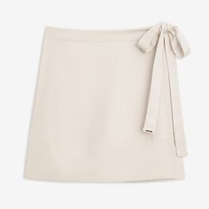 A classic reimagined– our lived-in midi-length Wrap Skirt is chic, comfortable, and easy to throw on. Made from our unique blend of tencil and linen, the fabric is lightweight, breathable, and oh-so-soft. Featuring an always-flattering fit and adjustable tie, making our skirt a versatile all-season staple.DETAILS:Recycled PET logo charm 88% Tencel, 12% Linen Adjustable waist tie Elegant Wrap Skirt For Spring, Summer Rayon Relaxed Skirt, Summer Rayon Skirt With Relaxed Fit, Relaxed Rayon Summer Skirt, Versatile Relaxed Summer Mini Skirt, Summer Flared Skirt In Viscose, Versatile Relaxed Mini Skirt For Summer, Summer Flared Skirt Made Of Viscose, Versatile Summer Skirt