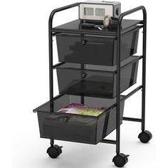 a black cart with three drawers and a microwave on top