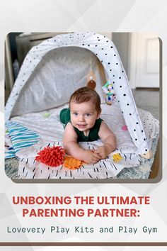 a baby laying in a play gym with the words unboxing the ultimate guide for parents