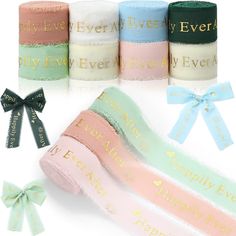 four rolls of happy ever happily ever ribbon in pastel colors with ribbons tied around them