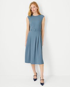 Elevate your wardrobe with the Ann Taylor Petite Pleated Belted Crew Neck Dress, a testament to refined elegance and modern style. This dress features a fluid crepe construction that gracefully flows below the knee, ensuring a sophisticated silhouette for any occasion.

- **Size:** Petite 0
- **Color:** Blue Echo
- **Material:** Shell: 95% Polyester, 5% Spandex; Lining: 100% Polyester
- **Fit:** Tailored fit
- **Length:** 28" from natural waist
- **Features:** Crew neck, cap sleeves, self-tie bu Ann Taylor Loft Outfits, Minimalist Work Outfit, Taylor Blue Dress, Extra Dresses, Tweed Shift Dress, Crew Neck Dress, Crewneck Dress, Pleated Midi Dress, Feminine Dress