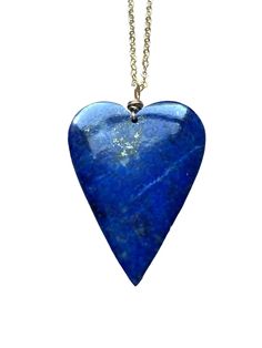 Stunning 35x26mm blue Lapis Lazuli heart pendants have been made into a beautiful crystal necklace. In options of gold or silver this necklace is a show stopper. Perfect gift for that special someone in your life, they will cherish this handmade piece for years to come and will be a luxurious classic necklace to add to their wardrobe. This piece looks great worn alone or layered with other classy pieces.  Handcrafted Lapis Lazuli heart Pendant Necklace *Beautiful gift for her *High quality genui Spiritual Blue Jewelry With Heart Charm, Blue Gemstone Heart Necklace For Gift, Blue Gemstone Heart Cut Necklace, Blue Heart-shaped Spiritual Necklace, Blue Spiritual Heart Pendant Jewelry, Spiritual Blue Heart Pendant Jewelry, Sapphire Heart Pendant Necklace With Heart Charm, Spiritual Blue Heart Pendant Necklace, Sapphire Necklace For Valentine's Day Gift