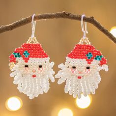 Santa Claus brings Christmas cheer in these charming earrings by Mirian Zet. Crafted by hand they come to life in tiny seed beads meticulously placed one by one. With his rosy cheeks long white beard and crimson hat Father Christmas is sure to bring a smile. Christmas Beading, Rosy Cheeks, Buy Bead, White Beard, Beaded Dangle Earrings, Christmas Earrings, Father Christmas, Christmas Jewelry, Bead Jewellery