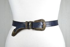 Full length buckle to end: 39''/98 cm Shortest wearable length: 31''/79 cm Longest wearable length: 35''/89 cm Width: 0.8''/2.7 cm In a good vintage condition. See my wide collection of other vintage belts: https://www.etsy.com/shop/RetroBelt?ref=seller-platform-mcnav Vintage Adjustable Belt Buckles For Rodeo, Vintage Leather Belts For Ranch, Western Style Belts For Rodeo, Western Belt With Antique Buckle And Adjustable Fit, Western Belts With Antique Buckle And Adjustable Fit, Western Antique Belt Buckles For Festival, Western Belts And Suspenders With Antique Buckle, Western Belts And Suspenders With Antique Buckle For Ranch, Vintage Adjustable Belt Buckles With Brass Buckle