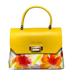 Ivan Troy Women's Ann Yellow Floral Print Italian Leather Strap Shoulder Handbag Material: Genuine Italian Leather Gold Metal Hardware Dimensions: H8” X W09” X D3” Made In Italy The Ivan Troy Italian Leather Floral Tote Top Handle Bag Is A Stylish And Fashionable Accessory Made From High-Quality Leather Materials. The Bag Features A Beautiful Floral Design That Adds A Touch Of Elegance And Sophistication To Any Outfit. Handbag Made In Italy And Designed To Be Worn Over The Shoulder. The Tote Bag Summer Formal Leather Bags, Formal Leather Bags For Summer, Luxury Leather Satchel For Summer, Designer Yellow Bags For Summer, Luxury Yellow Shoulder Bag For Summer, Summer Leather Bags With Gold-tone Hardware, Yellow Luxury Bag For Spring, Yellow Luxury Spring Bag, Luxury Yellow Spring Bag