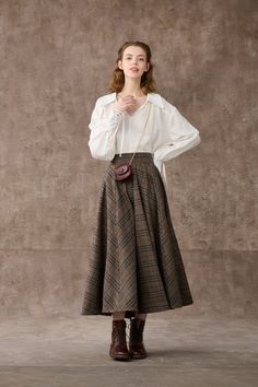 Modern Victorian Fashion Women, Elegant Brown Full Skirt Bottoms, Elegant Brown Asymmetrical Skirt, High Waist Brown Maxi Skirt For Fall, Elegant Brown Flared Skirt, Pleated Flared Wrap Skirt For Fall, Brown High-waist Winter Skirt, Chic Brown Maxi Skirt For Fall, Fall Flared Wrap Skirt