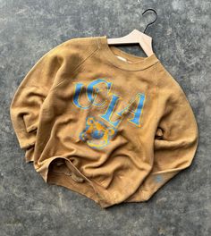 Vintage 90's UCLA Bruins Crewneck Sweatshirt Size Medium  20" x 23" Great graphics  Super soft & comfy Small Bruin sleeve hit  I custom Dyed this to a golden yellow color Any questions or additional info you need feel free to send a message. Thanks for looking, I add vintage items daily to the shop! Vintage Distressed Crew Neck Sweatshirt, Vintage Oversized Acid Wash Sweatshirt, Oversized Acid Wash Vintage Sweatshirt, Vintage Soft-washed Sweatshirt For Streetwear, Vintage Sweatshirt With Screen Print In Relaxed Fit, Vintage Distressed Acid Wash Sweatshirt, Vintage Relaxed Fit Screen Print Sweatshirt, Vintage Relaxed Fit Sweatshirt With Screen Print, Vintage Acid Wash Distressed Sweatshirt